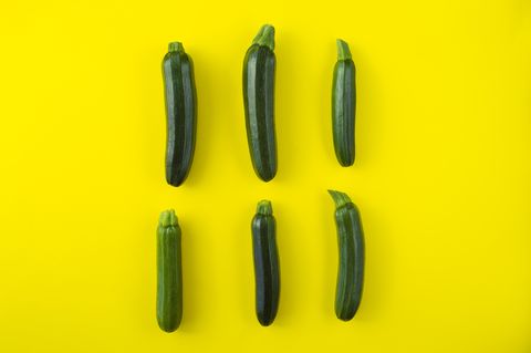 zucchini on yellow background
