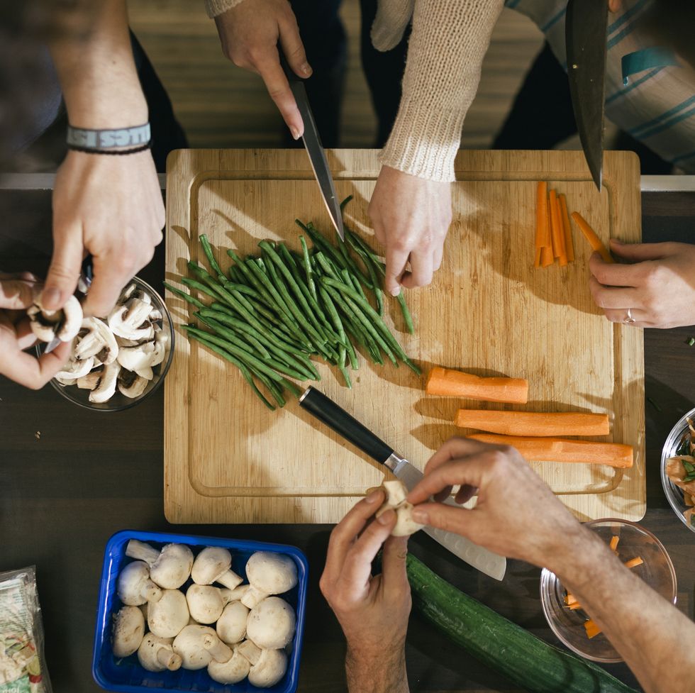 vegetables being cut in cooking class