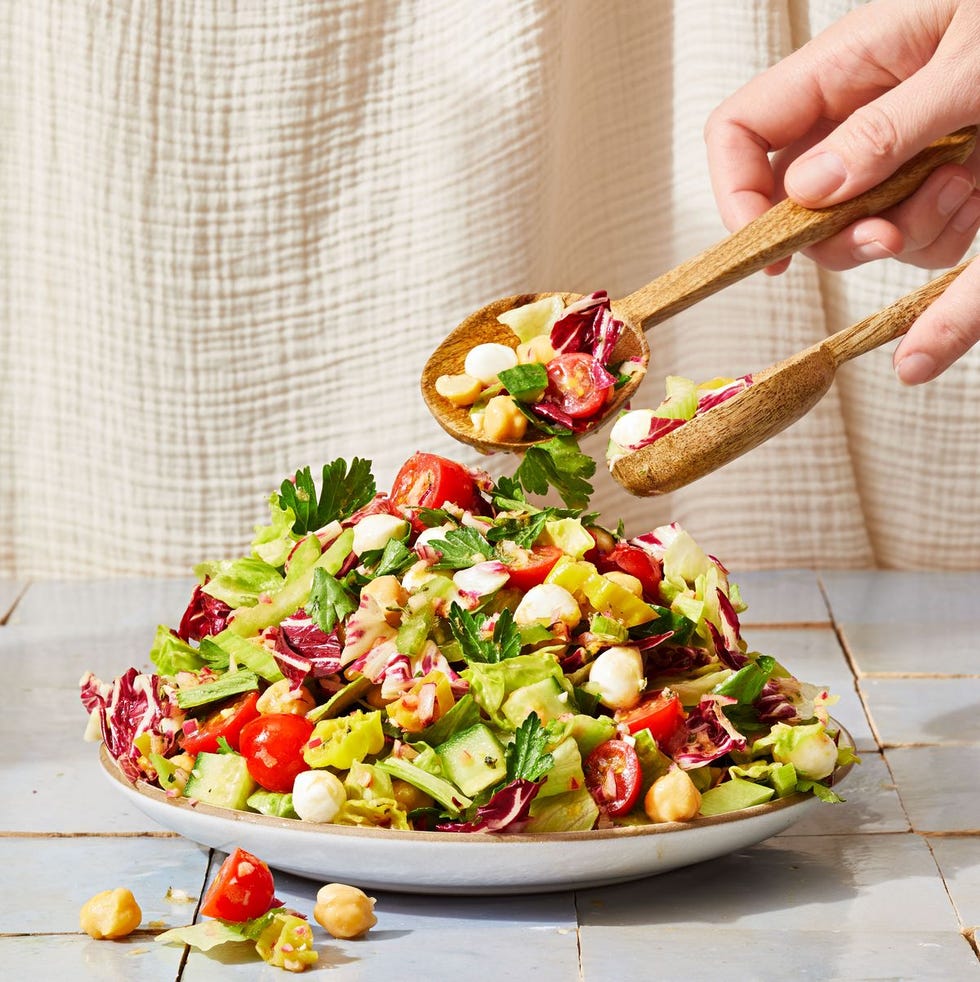 vegetarian antipasto salad with cucumber, tomato, chickpea, parsley and radicchio