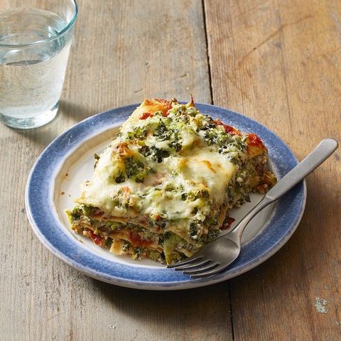 vegetarian lasagna with spinach and broccoli on a plate