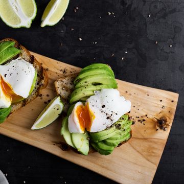 Vegetarian sandwiches with poached egg and sliced avocado