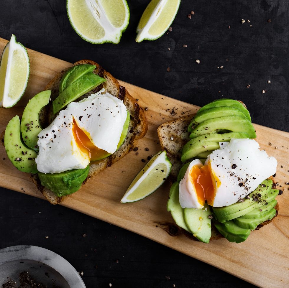 sandwich with poached egg and sliced avocado for good housekeeping's best high calorie snack