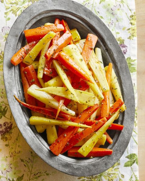 honey glazed carrots and parsnips on metal tray