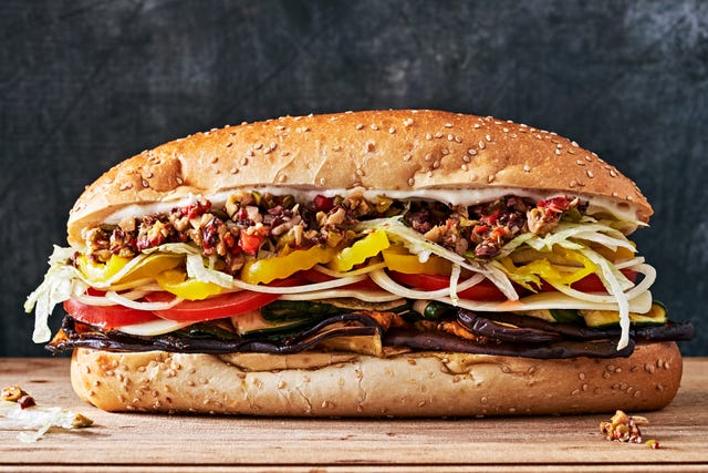 vegetarian italian sub stuffed with eggplant, zucchini and olive salad