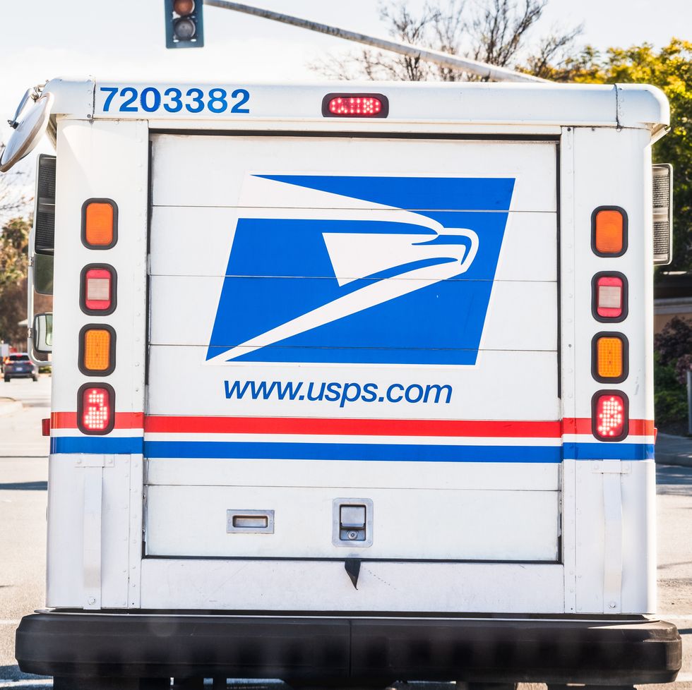 usps vehicle delivering mail and packages