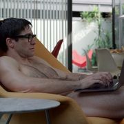 Sitting, Leg, Muscle, Furniture, Black hair, Reading, Leisure, Vacation, Glasses, Thigh, 