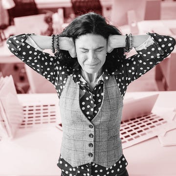 Mid adult interior designer having problem at office mid adult interior designer having problem at office