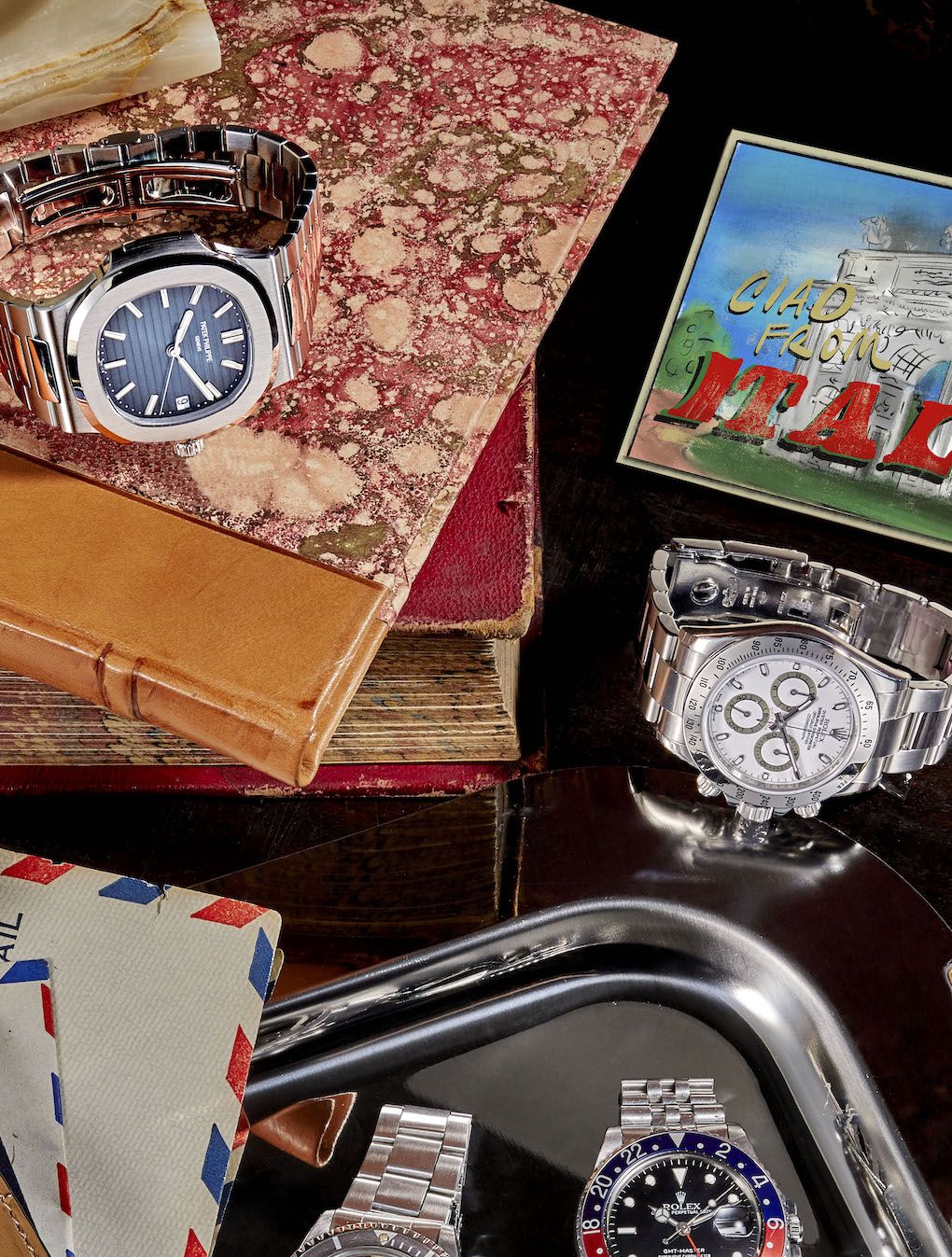 wristwatches, timepieces the patek philippe nautilus, rolex cosmograph daytona, and rolex sea dweller shown here will be on view at the new york watch auction at phillips on june 9 patek philippe nautilus 5711 1a circa 2021, rolex cosmograph daytona 116520 circa 2003, and rolex sea dweller 1665 double red with mark ii dial circa 1967, prices upon request phillipscom private collector’s rolex gmt master i 16750 circa 1987, courtesy of phillips pilot’s watch chronograph spitfire, $5,950 iwccom for additional credits, see the sourcebook, page 196