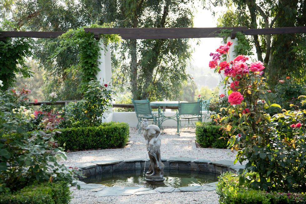san gabriel valley\, california home a fountain and its surrounding rose beds were restored to period revival glory