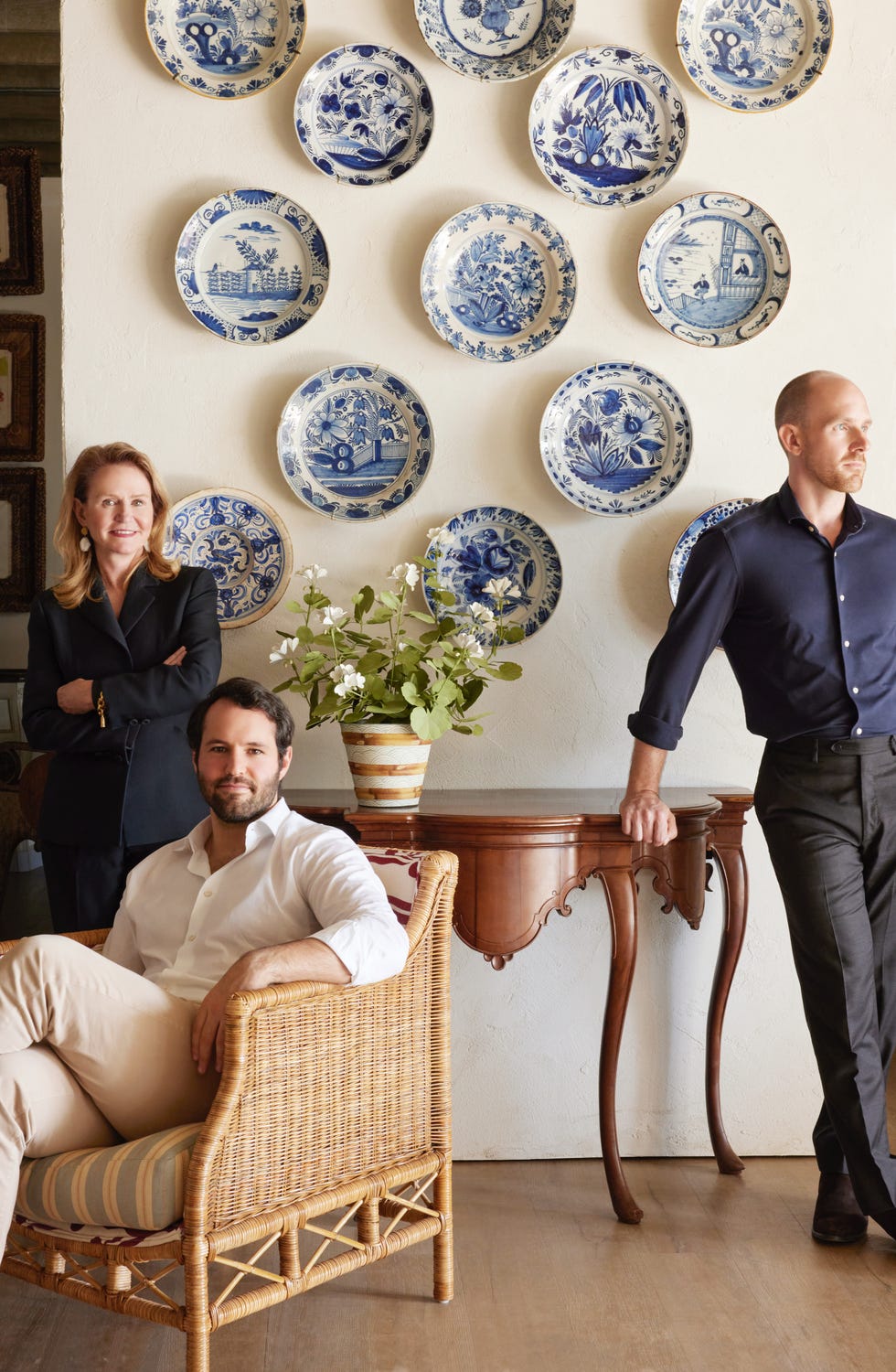 cris briger far left with sons augie briger center and charles peed with a rare mexican chippendale console