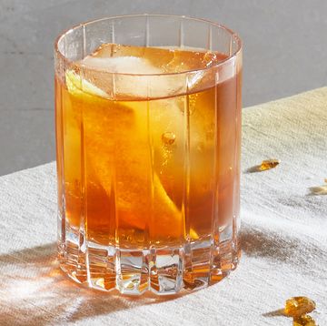 veranda 2024 color of the year electric amber old fashioned cocktail