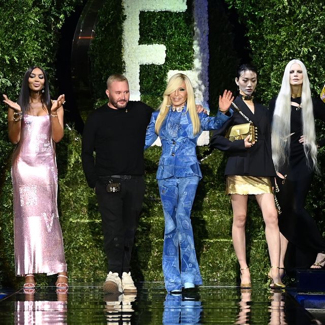 milan, italy   september 26 maria carla boscono, naomi campbell, fashion designer kim jones and donatella versace acknowledges the applause of the audience at the versace special event during the milan fashion week   spring  summer 2022 on september 26, 2021 in milan, italy photo by daniele venturellidaniele venturelli  getty images