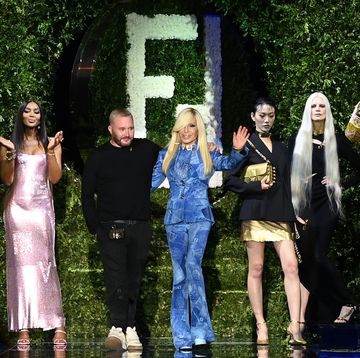 milan, italy   september 26 maria carla boscono, naomi campbell, fashion designer kim jones and donatella versace acknowledges the applause of the audience at the versace special event during the milan fashion week   spring  summer 2022 on september 26, 2021 in milan, italy photo by daniele venturellidaniele venturelli  getty images