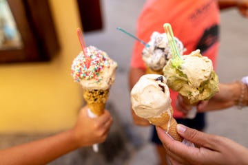 very appetizing ice cream in the hands of people