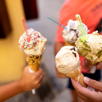 very appetizing ice cream in the hands of people.