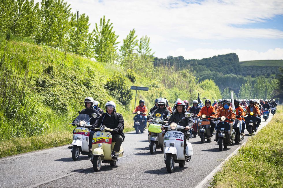 a group of people riding motorcycles