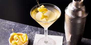 james bond's classic drink order with gin, vodka. lillet and a lemon twist