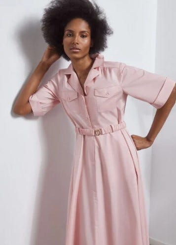 a person in a pink dress