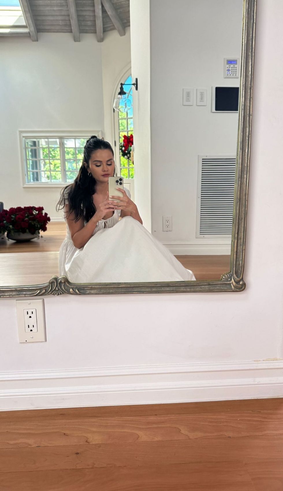 white dress summer 2023 with puffed sleeves selena gomez