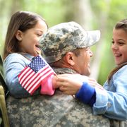 veterans day quotes  daughters hugging their veteran father