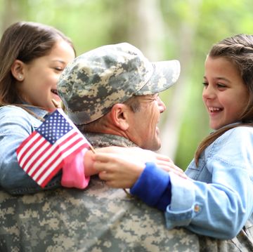 veterans day quotes  daughters hugging their veteran father