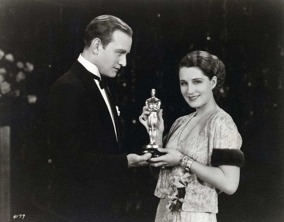 Conrad Nagel Presents Oscar to Norma Shearer