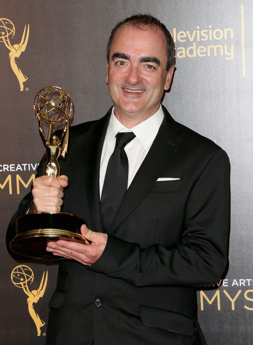 los angeles, ca   september 10  composer victor reyes, winner of outstanding music composition for a limited series, movie or special original dramatic score, poses in the press room at the 2016 creative arts emmy awards at microsoft theater on september 10, 2016 in los angeles, california  photo by frederick m browngetty images