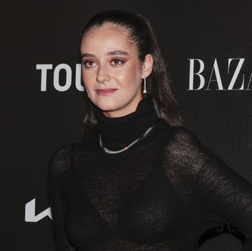 victoria federica con vestido negro de transparencias en la alfombra roja