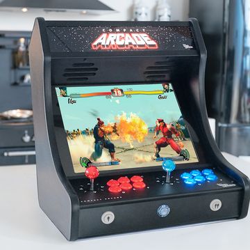 Games, Video game arcade cabinet, Arcade game, Electronic device, Technology, Recreation, Room, Toy, Fictional character, 