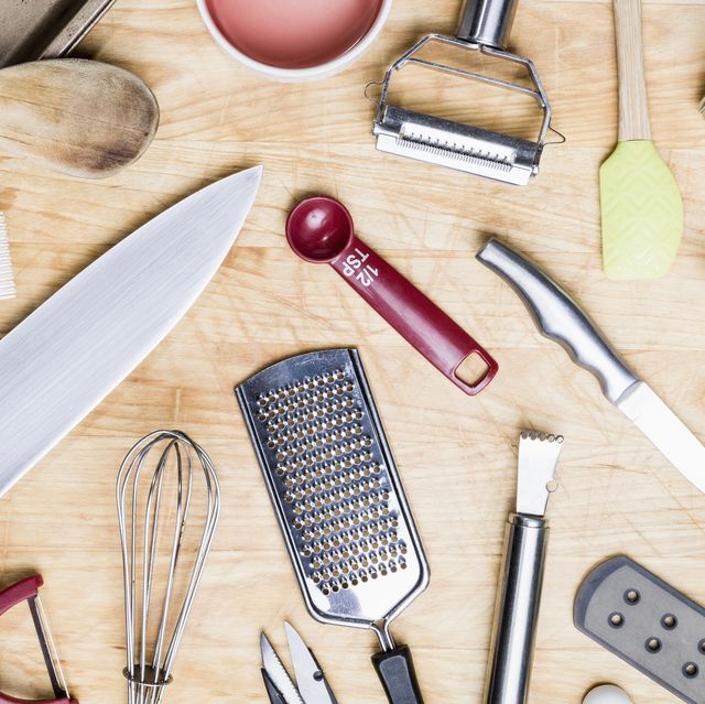 view from above kitchen utensils on wooden surface knolling