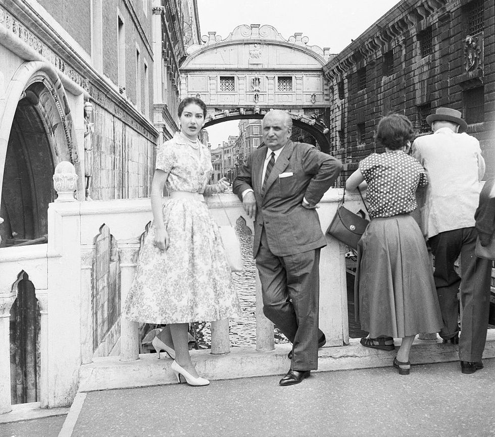 opera singer maria callas and husband on outdoor balcony