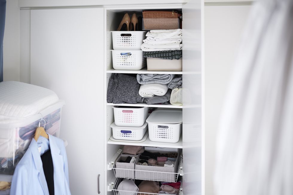 view of baskets in open wardrobe