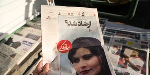 headlines on iranian newspapers over the death of young women killed in morality police arrest