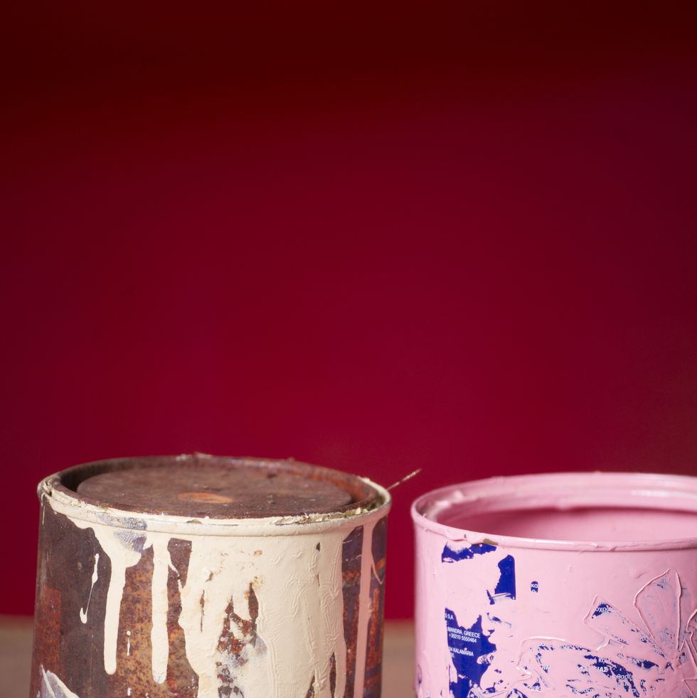 view of rusty paint cans