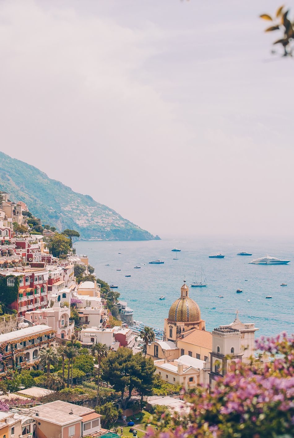 view of the town of positano with flowers