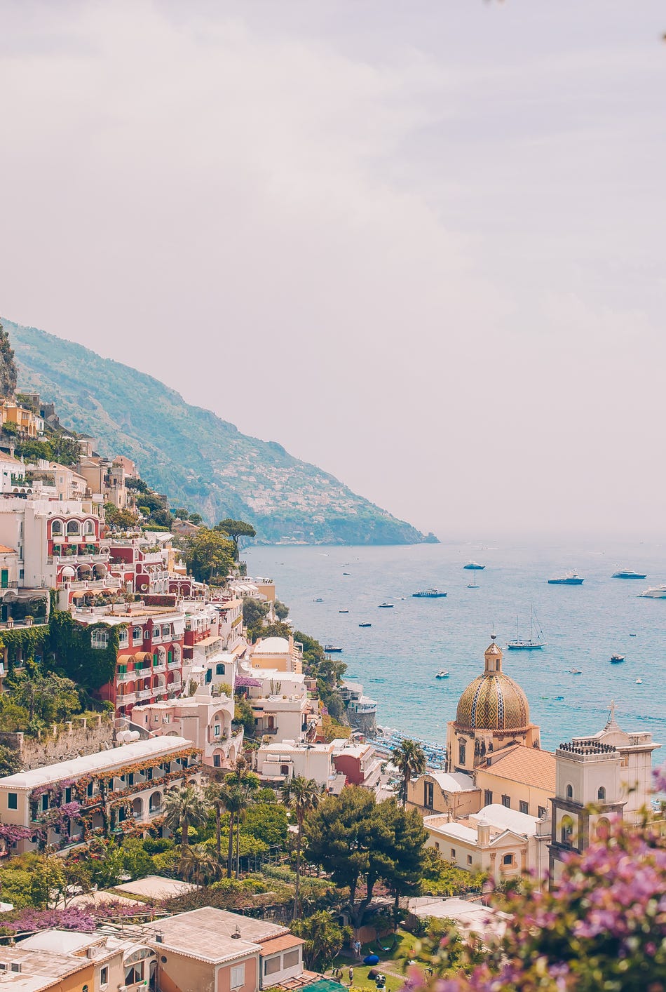 view of the town of positano with flowers