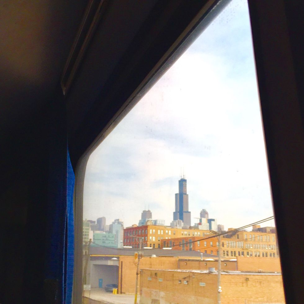 best train trips view of willis tower from amtrak train entering chicago illinois