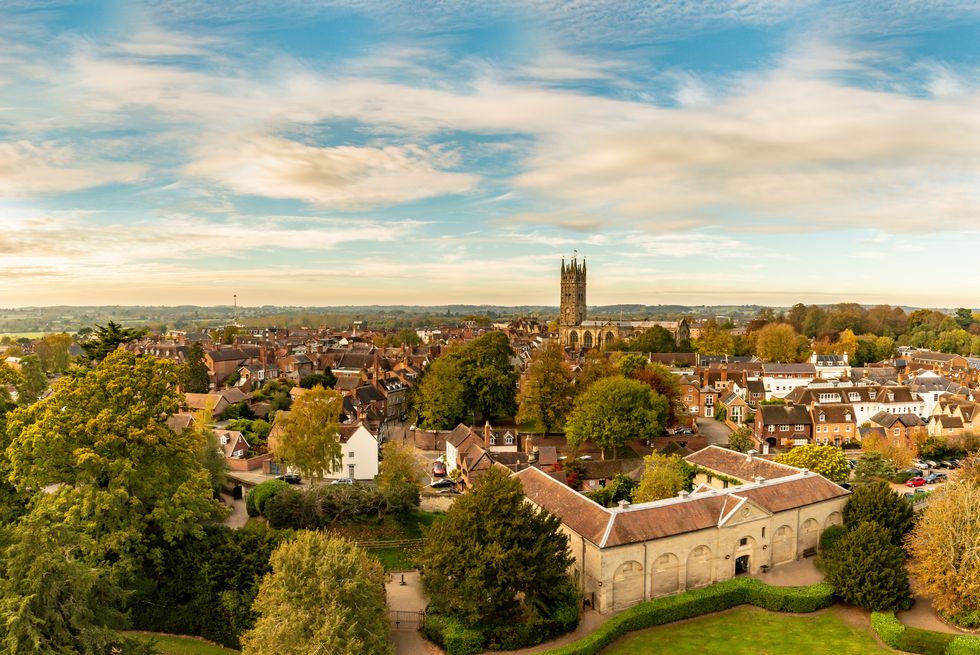 view over the town of warwick with church