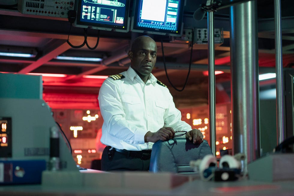 paterson joseph wearing naval uniform standing in submarine control room in vigil
