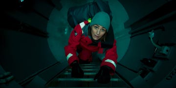 vigil  suranne jones as amy silva, climbing inside the submarine's launchpad corridor