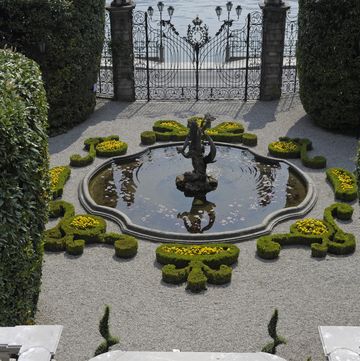 the italian garden of villa carlotta, overlooking lake como, tremezzina, lombardy, italy