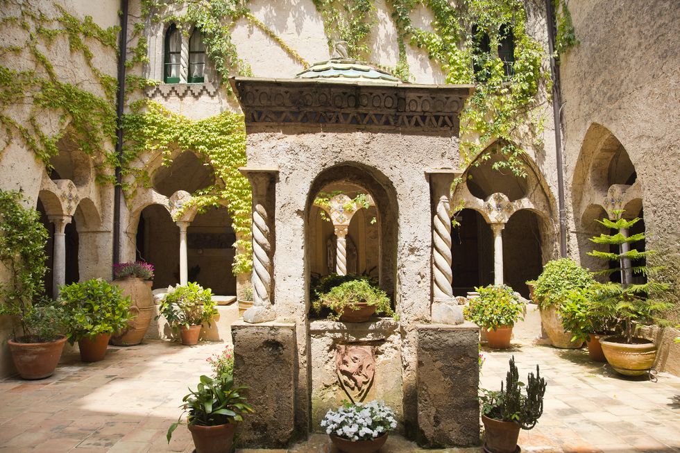 Courtyard, Arch, Property, Building, Architecture, Hacienda, House, Estate, Tree, Real estate, 