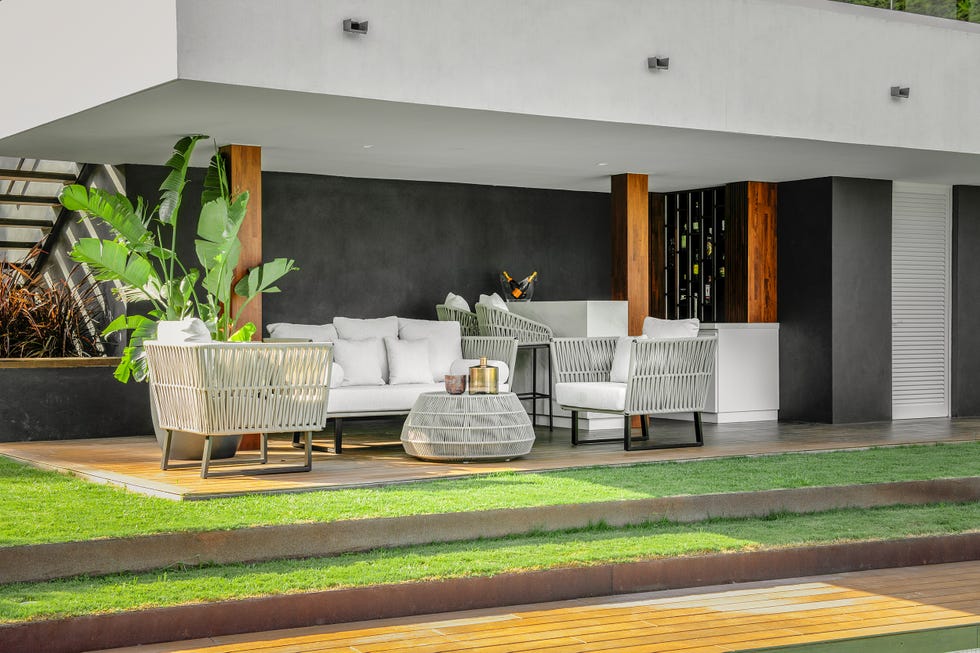 terraza con muebles de exterior de cuerda