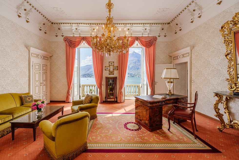 Elegant living room with a view of a lake and mountain