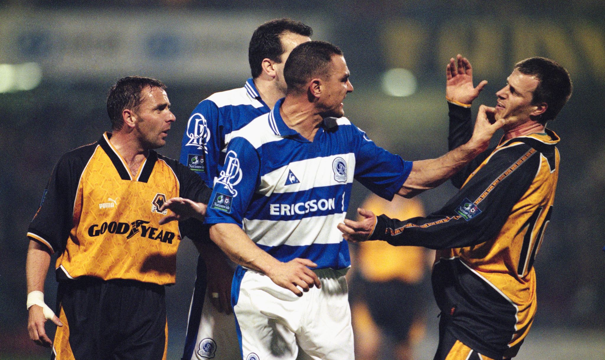 london, united kingdom april 01 qpr player vinnie jones c gets to grips with wolves player steve claridge as paul simpson l and neil ruddock obscured look on during a league division one match between queens park rangers and wolverhampton wanderers at loftus road on april 1, 1998 in london, england photo by alex liveseyallsportgetty images