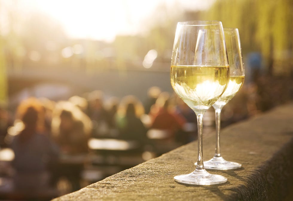 Stemware, Wine glass, Champagne stemware, Glass, Drink, Drinkware, Wine, Yellow, Alcoholic beverage, White wine, 
