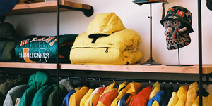 Yellow, Room, Jacket, Textile, Furniture, T-shirt, Outerwear, Shelf, Clothes hanger, Closet, 