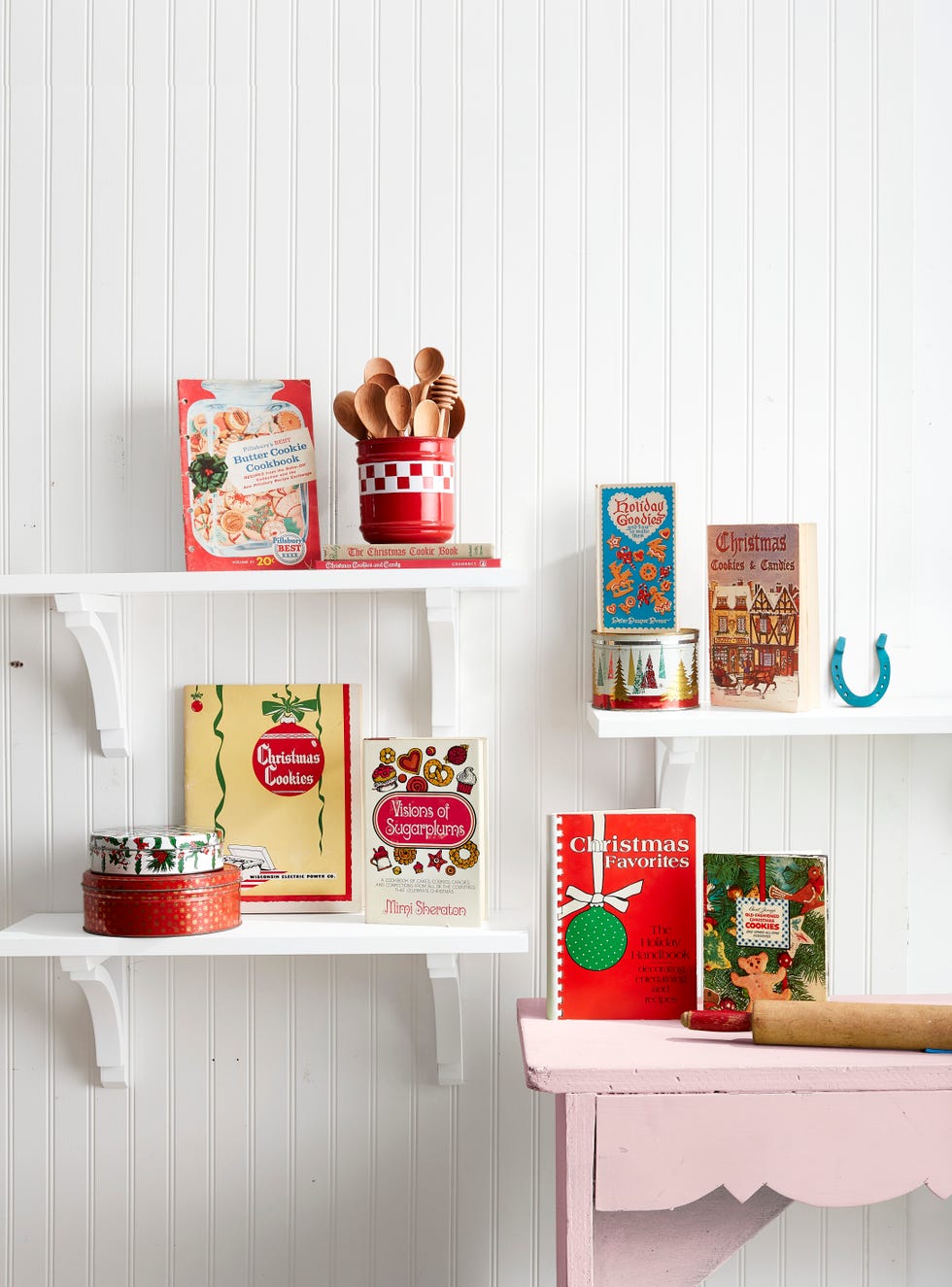 grouping of vintage christmas cookbooks