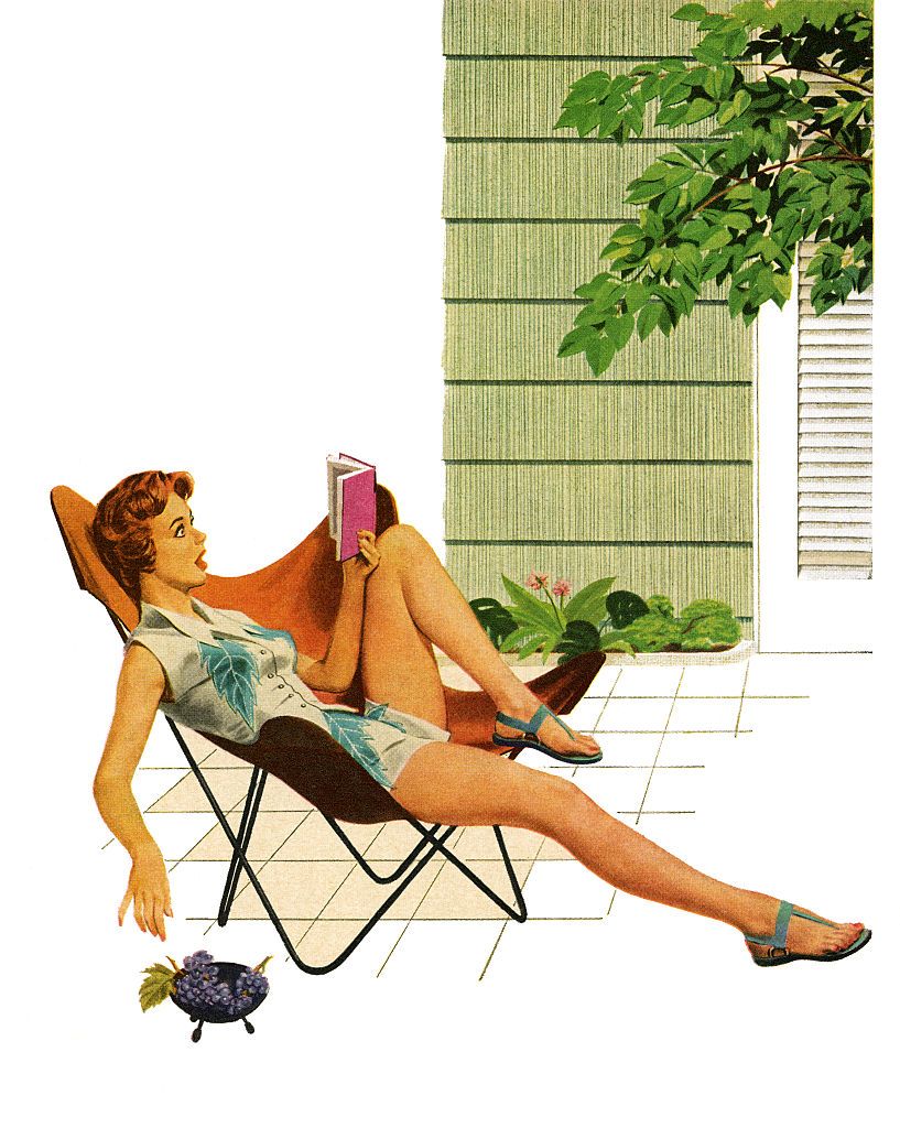 woman reading book outdoors