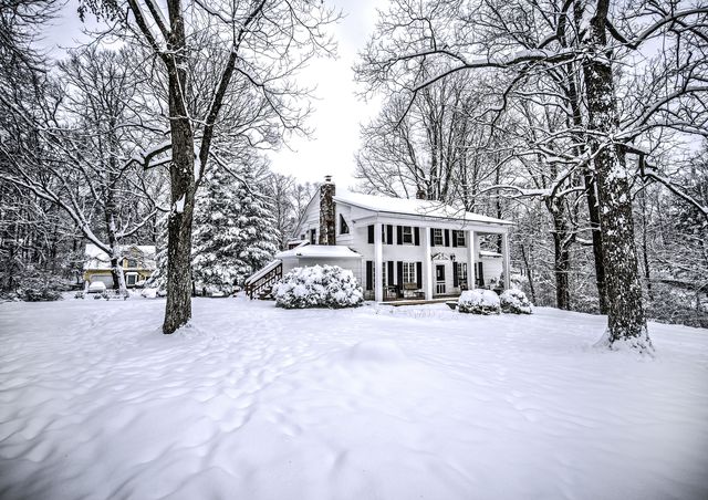 Vintage old house in fresh snow